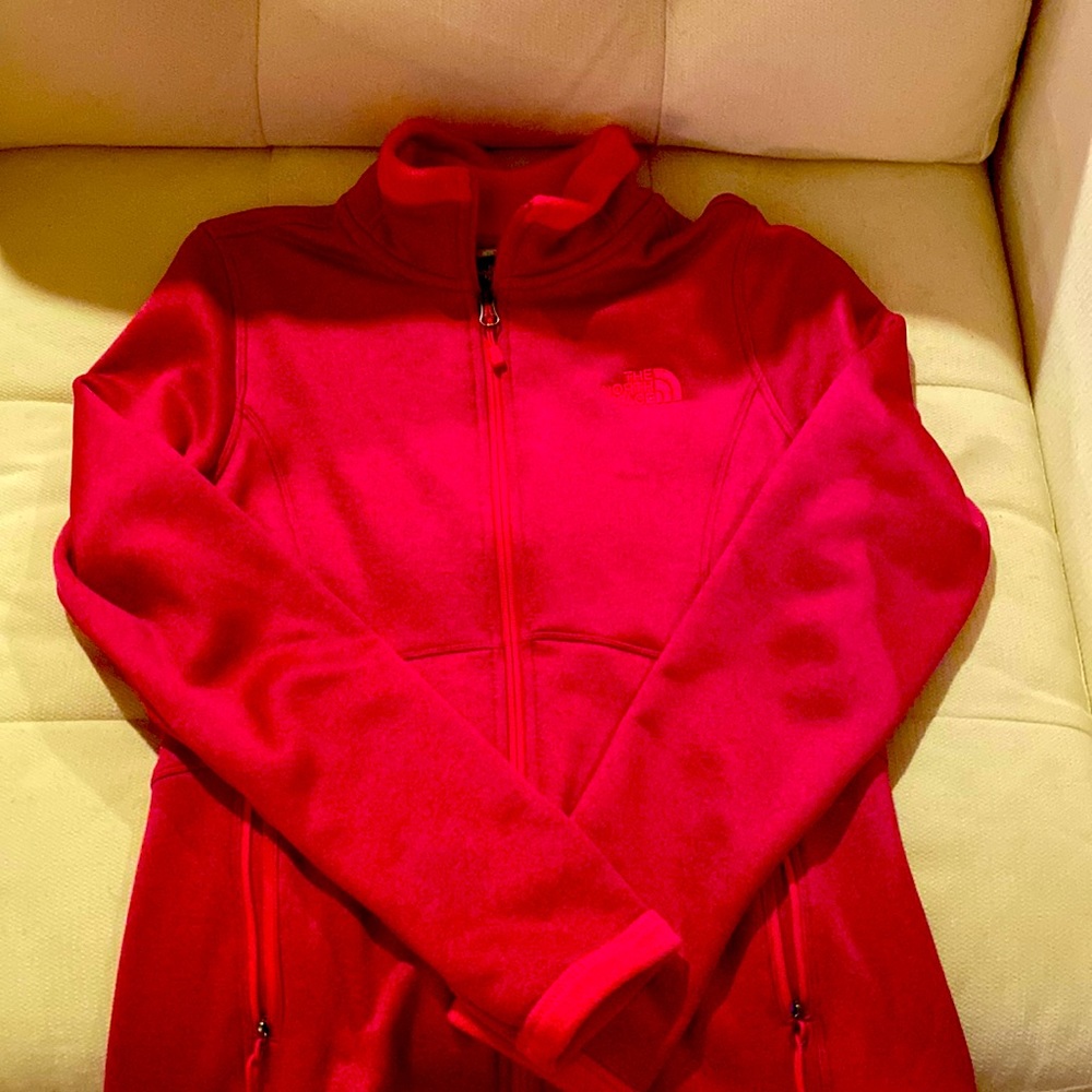 Bright pink North face jacket.  Very soft material and very warm. Worn twice.